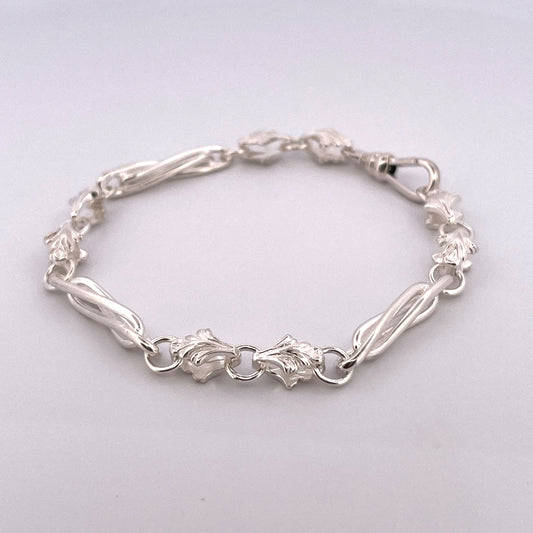 B1163 Silver twisted bar and leaf style link bracelet