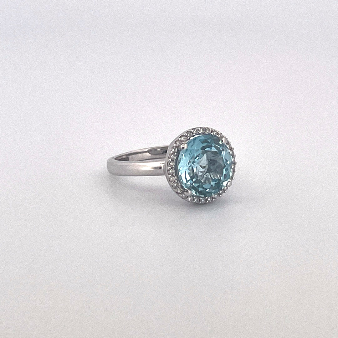 R0827 9ct White Gold Blue Topaz and Diamond cluster ring