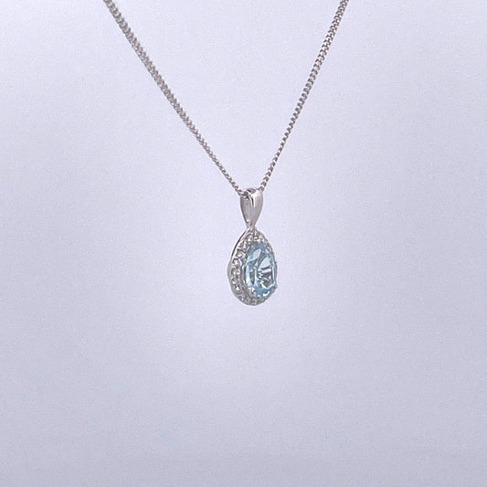 P2515 9ct white gold pear shape blue topaz and diamond cluster