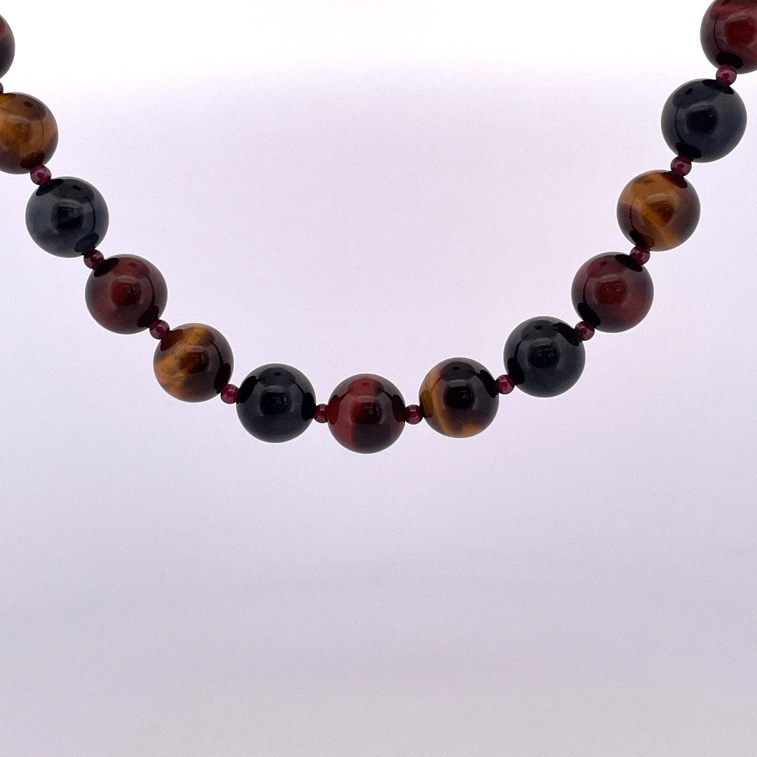PB407 Tigerseye 20" 12mm with garnets inbetween
