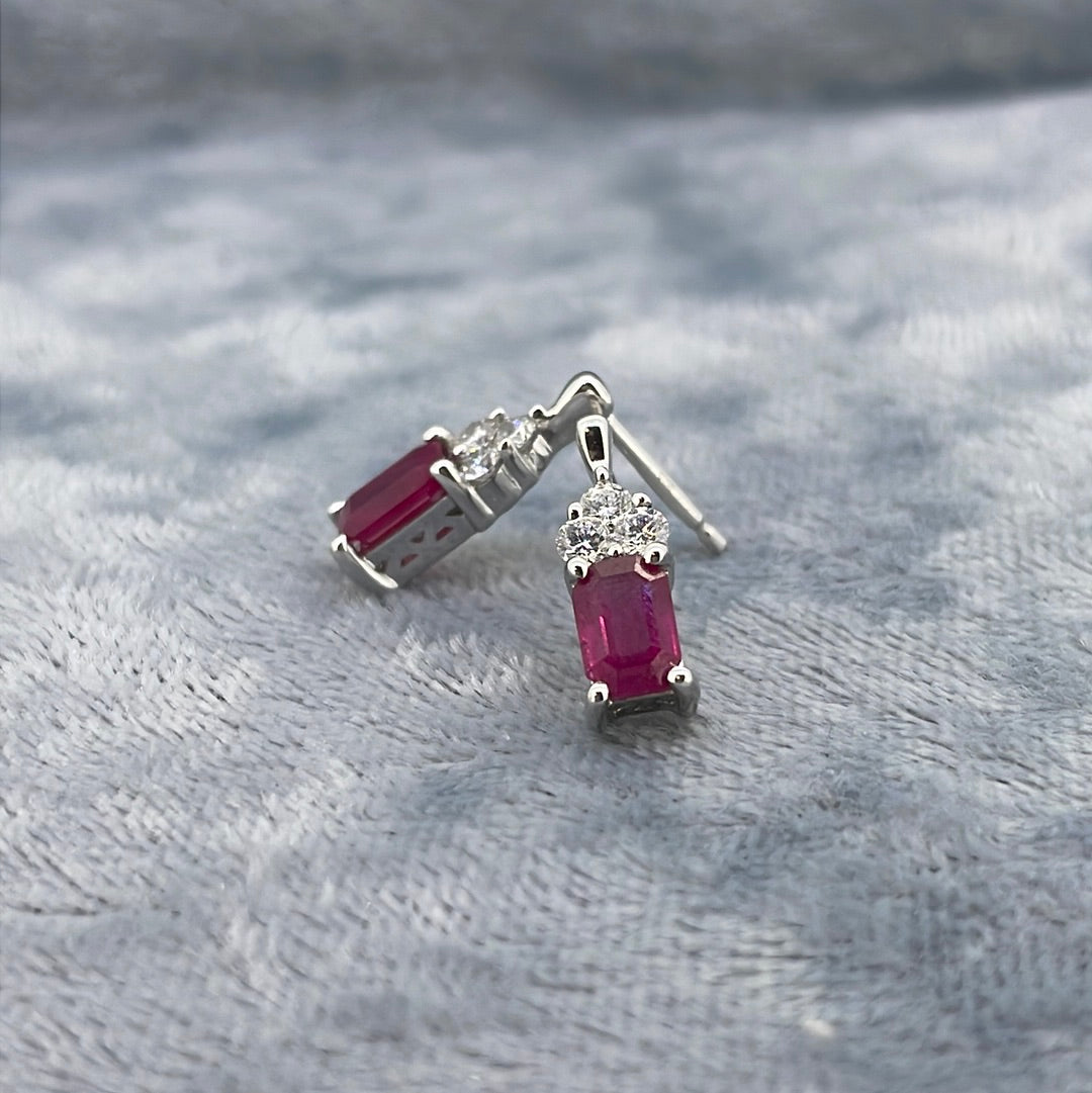 E2741 9ct Studs Ruby 6x4mm rect with three small diamonds above E4053