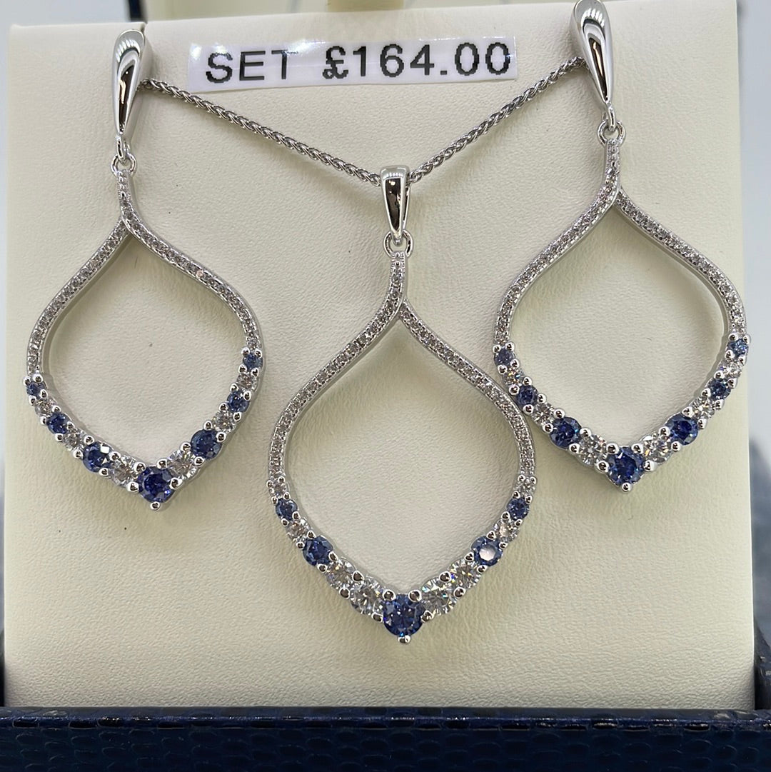 P2570 Sil Tanz c.z Loop with grad stones claw set 6784