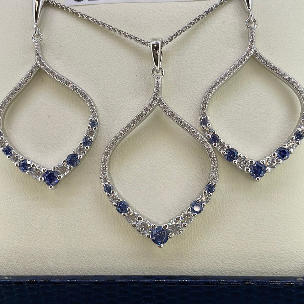 P2570 Sil Tanz c.z Loop with grad stones claw set 6784
