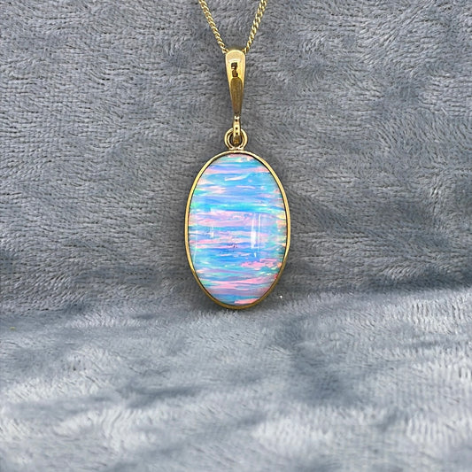 P2508 9ct Opal Oval blue stripe/green STP10