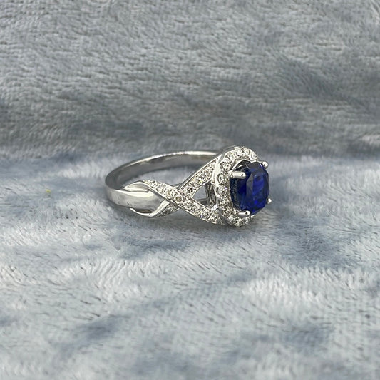 R0449 18ct Sapphire 2.30ct And dia 0.41ct cluster with cross shoulders