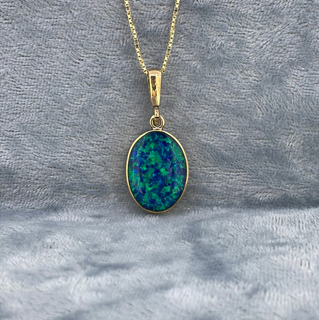 P2504 9ct Opal Oval green/blue stripe STP11