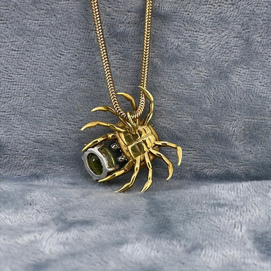 P1347 9ct Marli Garnet Crab with diamond eyes 3.22ct