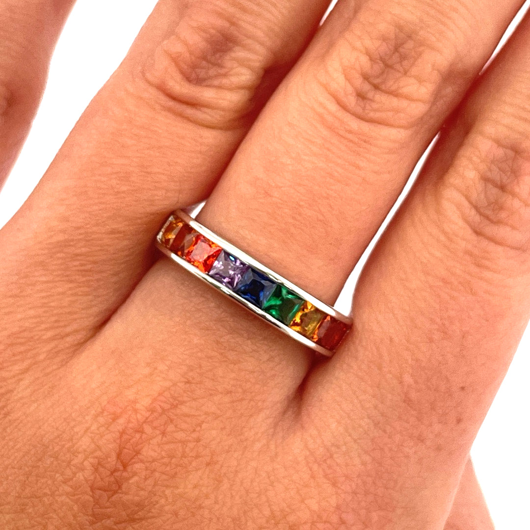R0911 silver rainbow c.z channel set ring