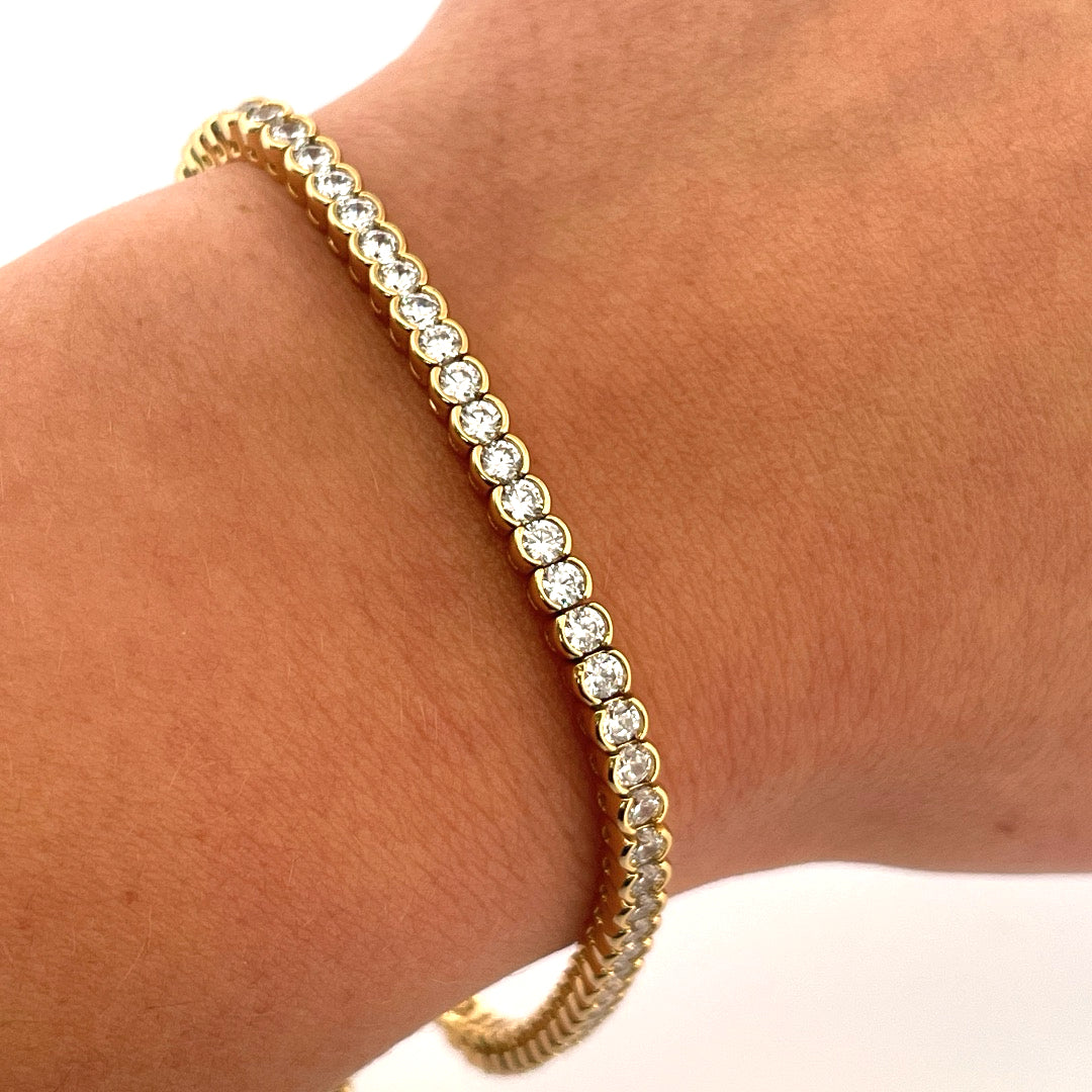 B1228 gold plated c.z tennis bracelet