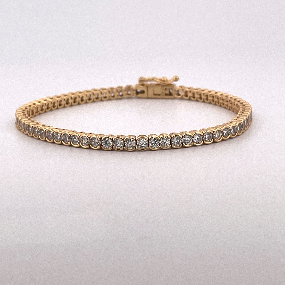 B1228 gold plated c.z tennis bracelet