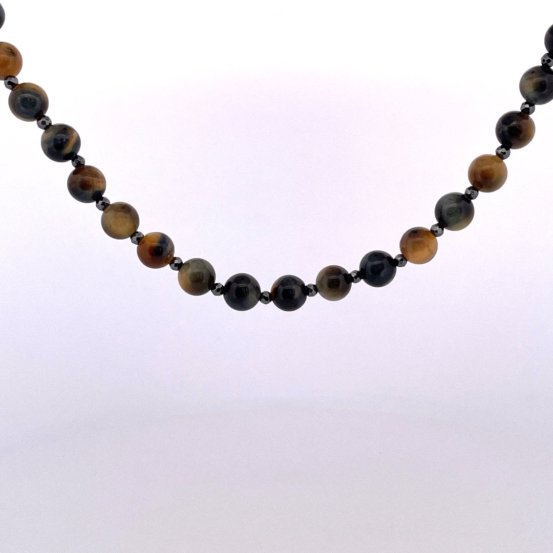 PB410 Tigerseye 20" 8mm blue/gold strung with faceted 3mm hematite