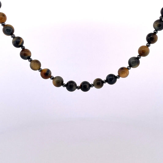 PB410 Tigerseye 20" 8mm blue/gold strung with faceted 3mm hematite