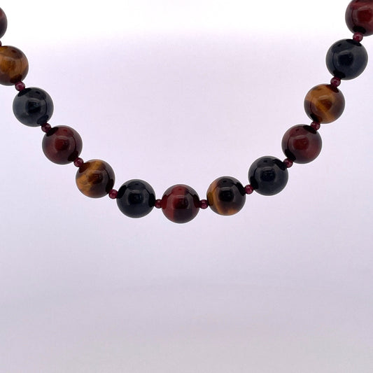 PB407 Tigerseye 20" 12mm with garnets inbetween