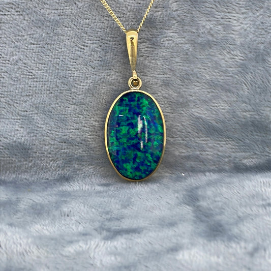 P2508 9ct Opal Oval blue stripe/green STP10