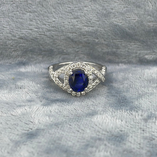 R0449 18ct Sapphire 2.30ct And dia 0.41ct cluster with cross shoulders